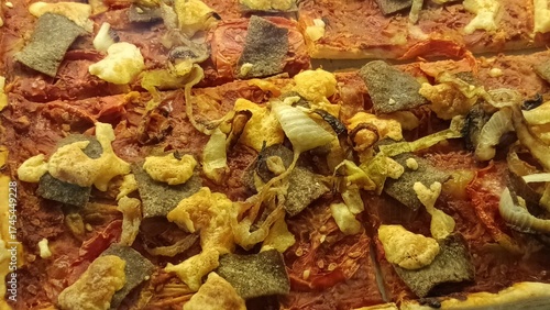 Foto A giant, square-shaped pizza sold in a cafe in Yogyakarta