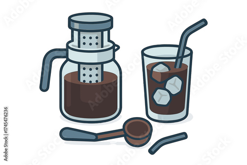 Cold brew coffee maker carafe and glass of iced coffee with ice and scoop