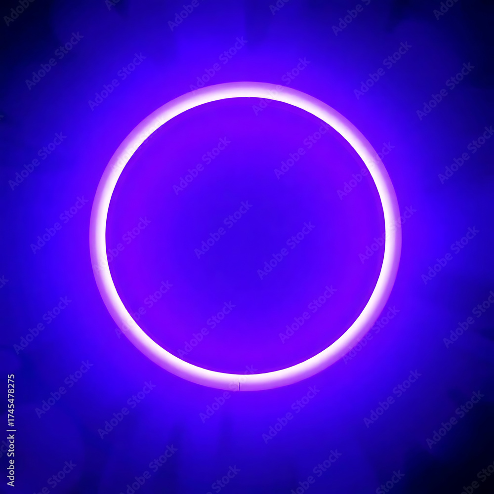 Obraz premium A Vivid Violet Glowing Ring of Light Emanates from a Dark Void Creating a Mystical Atmosphere of Cosmic Wonder