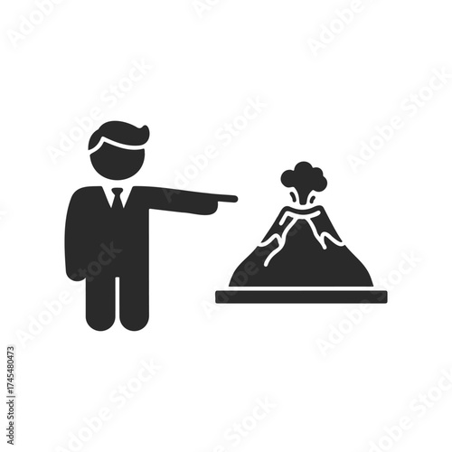 Silhouette of man presenting erupting volcano icon in black and white