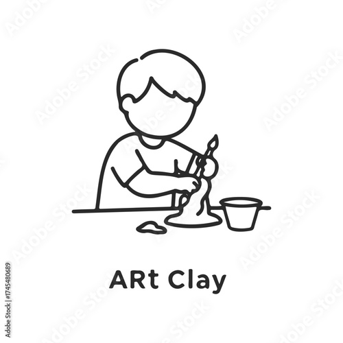 Child engaging in art clay activity
