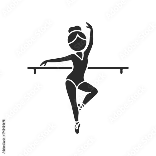 Elegant female ballerina silhouette performing ballet pose at barre