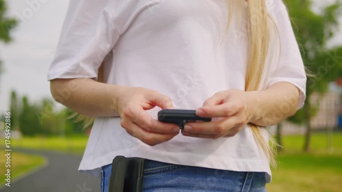 Pager beeper device close up on a desk, retro phone 90s instant communication and connection, sms messaging in the early 80s 90s digital age