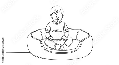 Toddler sitting in dog bed in linear black and white style