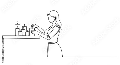 Woman arranging candles on shelf in linear black and white style