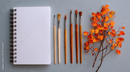 Wallpaper Mural blank spiral notebook paint brushes autumn leaves flat lay Torontodigital.ca