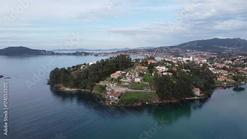 Aerial drone footage of Baiona and Playa América, featuring sandy beaches, calm waters, and coastal town views in Rías Baixas, Galicia, Spain  
