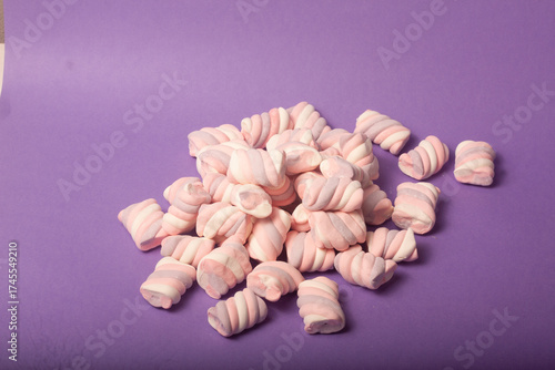 marshmallows on a purple backround
