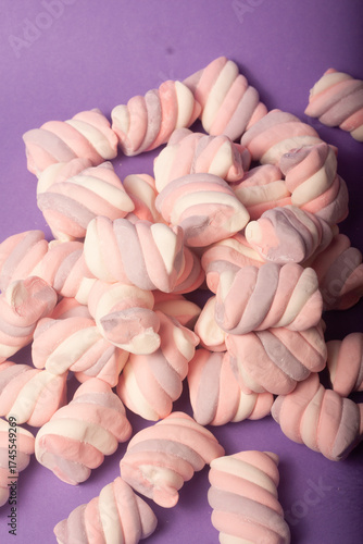 marshmallows on a purple backround
