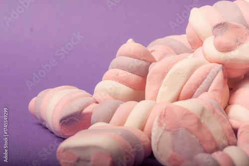 marshmallows on a purple backround

