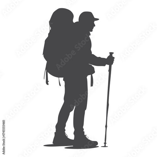Silhouette of a hiker with a backpack and trekking poles