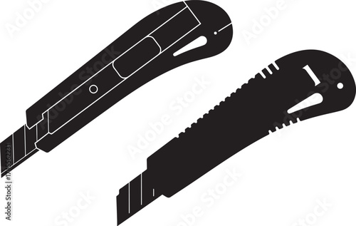 Two utility knife blades and handles in a stark black silhouette