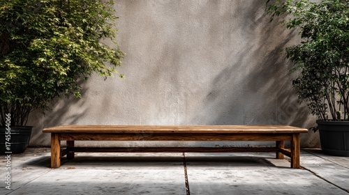 Wooden Outdoor Bench Surrounded by Lush Greenery and Smooth Wall