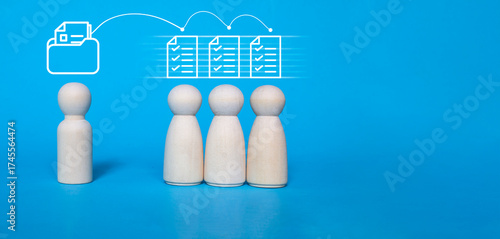 Document management and data transfer concept with wooden people figures and digital file sharing graphic