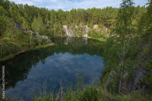 On Talkov stone lake on a sunny August day. Bazhov Places Nature Park. Sverdlovsk Region, Russia