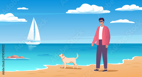 The young man walking on the beach with his dog