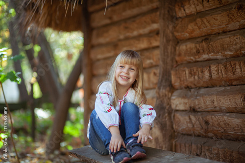 Charming Girl Enjoys Autumn Outdoors With Laughter During Halloween Festivities in October's Warm Sunlight