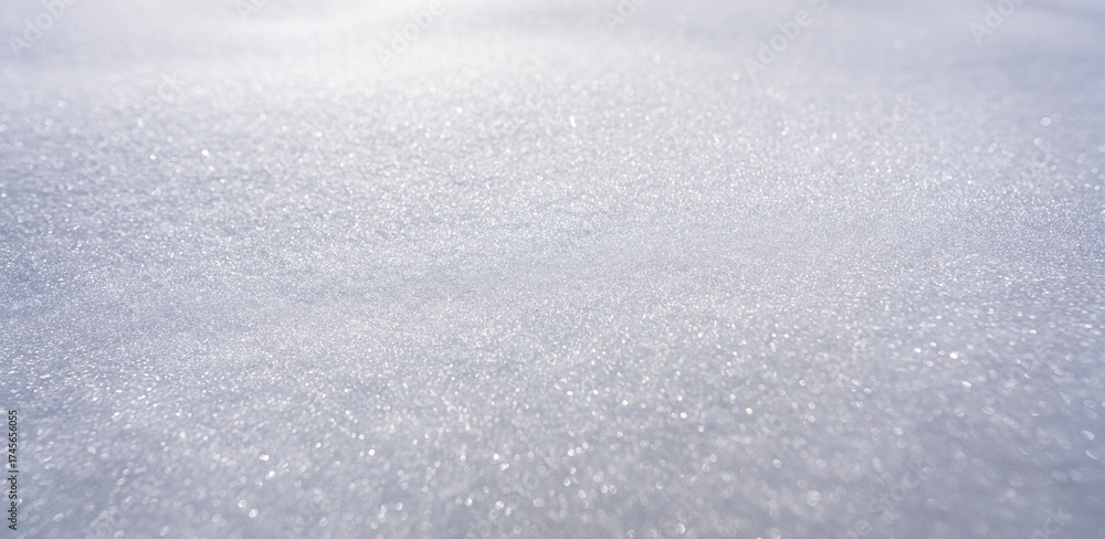 Obraz premium Snow covers the background. Snow shows the beauty of winter. Snow looks bright and white. Snow stays frozen all day. Snowy pattern. Snowflake falls. Cold and icy background.