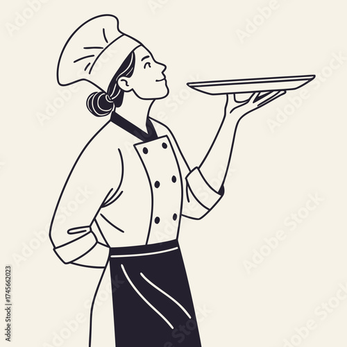 Chef holding a plate, ready to serve food