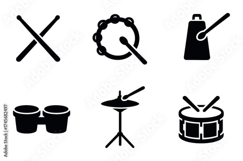 Silhouette of musical percussion instruments on black background