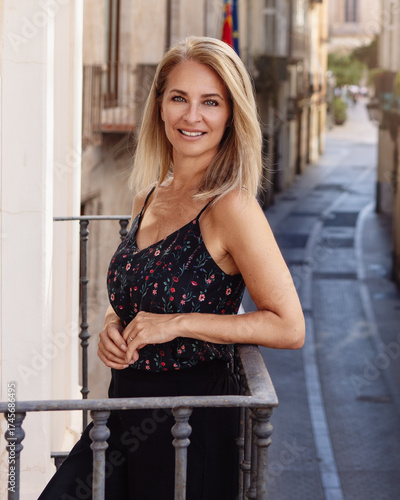 Woman on a balcony in Spain