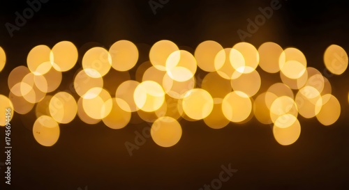 Warm golden sparkle texture with blurred glowing light background