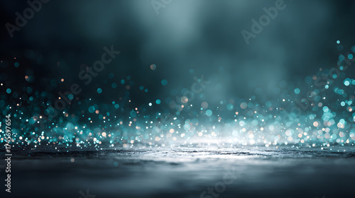 A mesmerizing blend of teal and silver particles shimmer against a dark background, creating an enchanting mood.
