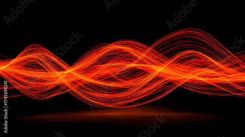 Abstract orange and red light waves create a vibrant, dynamic visual against a black background.