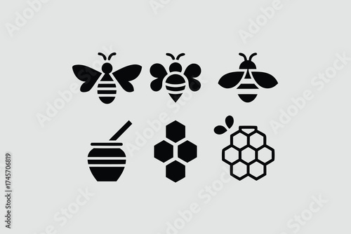 Bee and honey themed silhouettes for nature and apiary design .