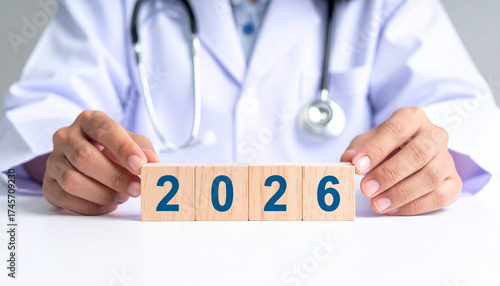 Wallpaper Mural New Year 2026 Medical Concept Doctor Arranging Wooden Blocks Torontodigital.ca