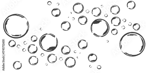 Transparent dew drops of clean aqua on a wet glass surface create a fresh blue pattern