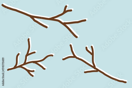 a set of winter branches without leaves in the snow