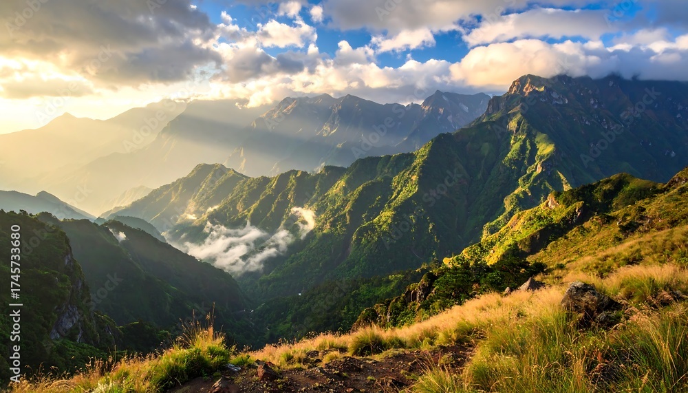 Obraz premium Stunning Mountain Landscape with Clouds and Sunlight in a Beautiful Nature