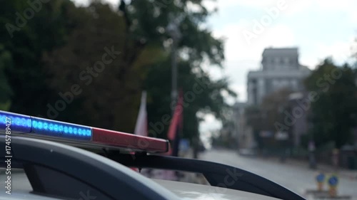 Police car with flashing lights in the center of Kyiv, Ukraine