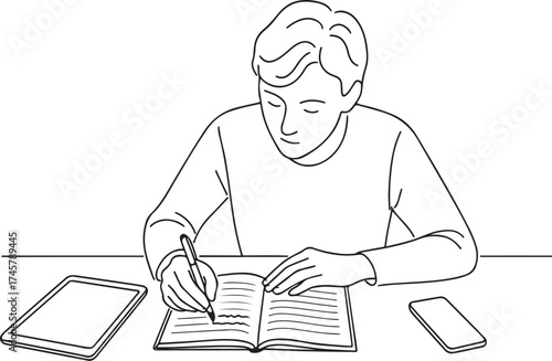 Young person diligently writing in an open notebook with a pen surrounded by digital devices like a tablet and smartphone illustrating modern learning and study habits