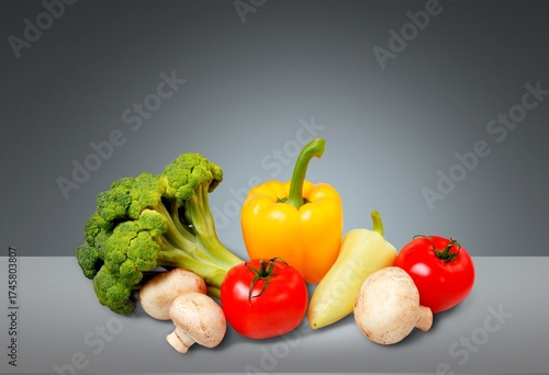 Fresh organic tasty fruits and vegetables on desk