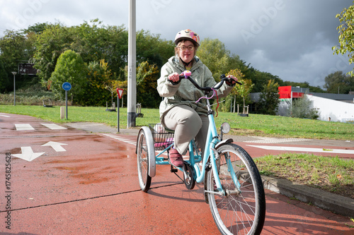 Portrait of a happy 43 yo woman with Down Syndrome, Tienen, Belgium