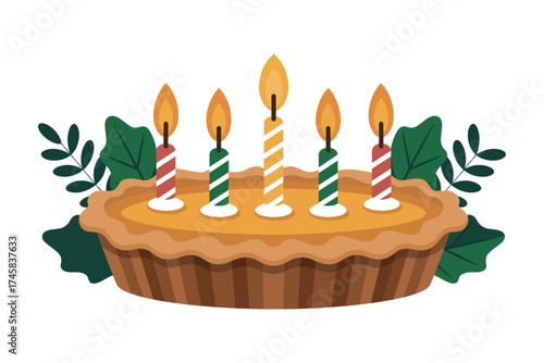 A festive pie adorned with five lit candles and surrounded by lush green foliage on a white background
