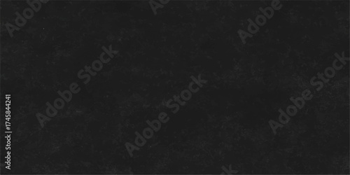 An old, rough black chalkboard with a dark texture and blank surface for a wallpaper or design background