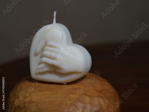 Heart Candle and Hands — Symbol of Love, Warmth and Connection