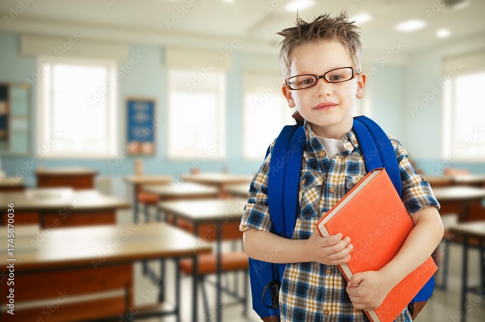 Obraz premium Happy child school student in classroom for learning