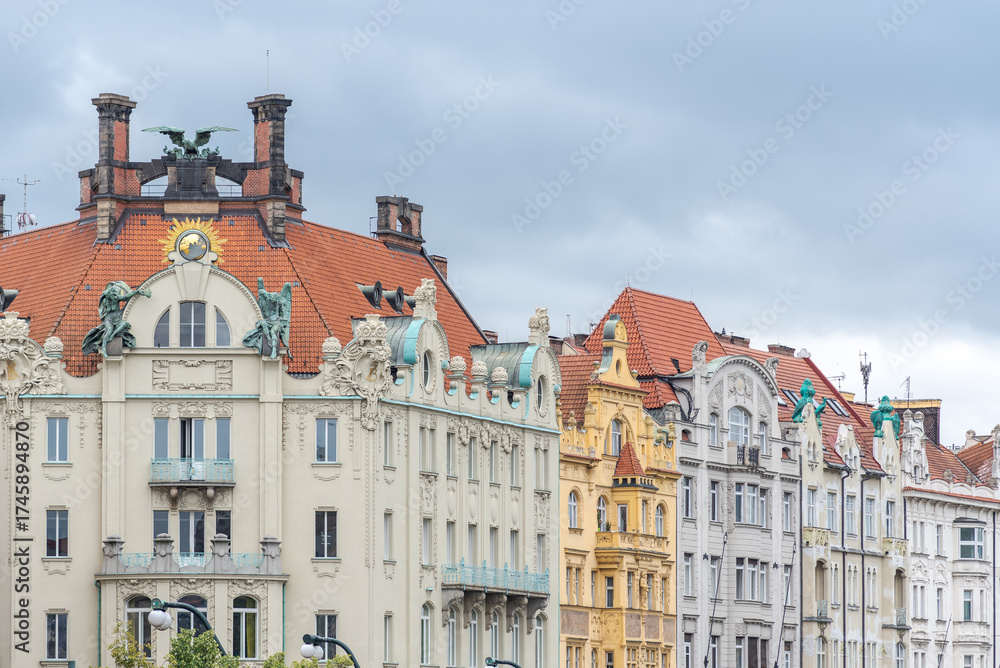 Obraz premium Historic buildings with ornate facades in Prague, Czech Republic