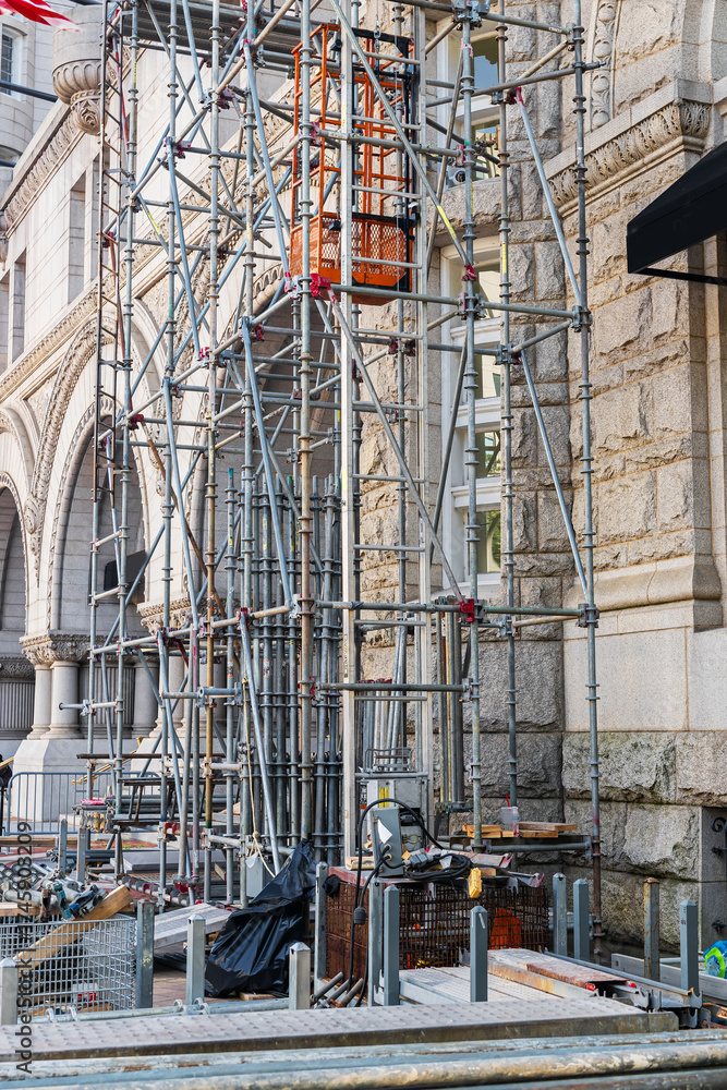 Fototapeta premium Steel scaffolding set up for facade restoration of a historic stone building