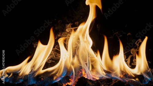 A close-up image depicting flames with vibrant colors, against a black background