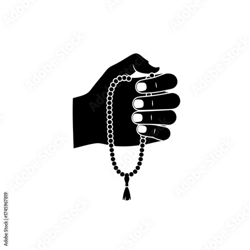 Hand holding islamic prayer beads tasbih, symbolizing faith and devotion