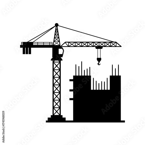 Silhouette of a construction crane and building structure