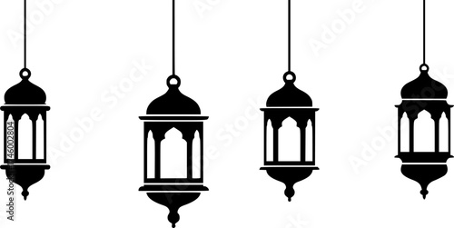 Four silhouetted islamic lanterns hanging against a white background
