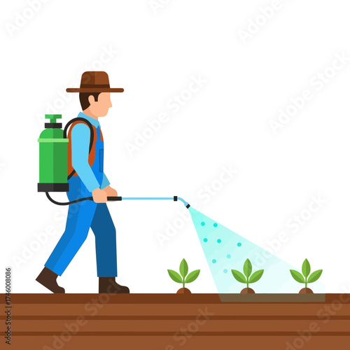 Farmer spraying pesticide on young plants in a field