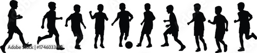 Silhouette of boys playing football together outdoors, showing teamwork, childhood energy, motion, and fun sports activity for design.Silhouette of boys playing football together outdoors, showing 