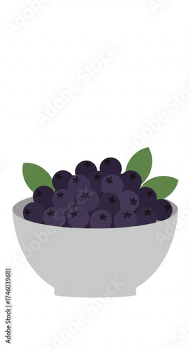 Bowl of chokeberries with green leaves on white background  